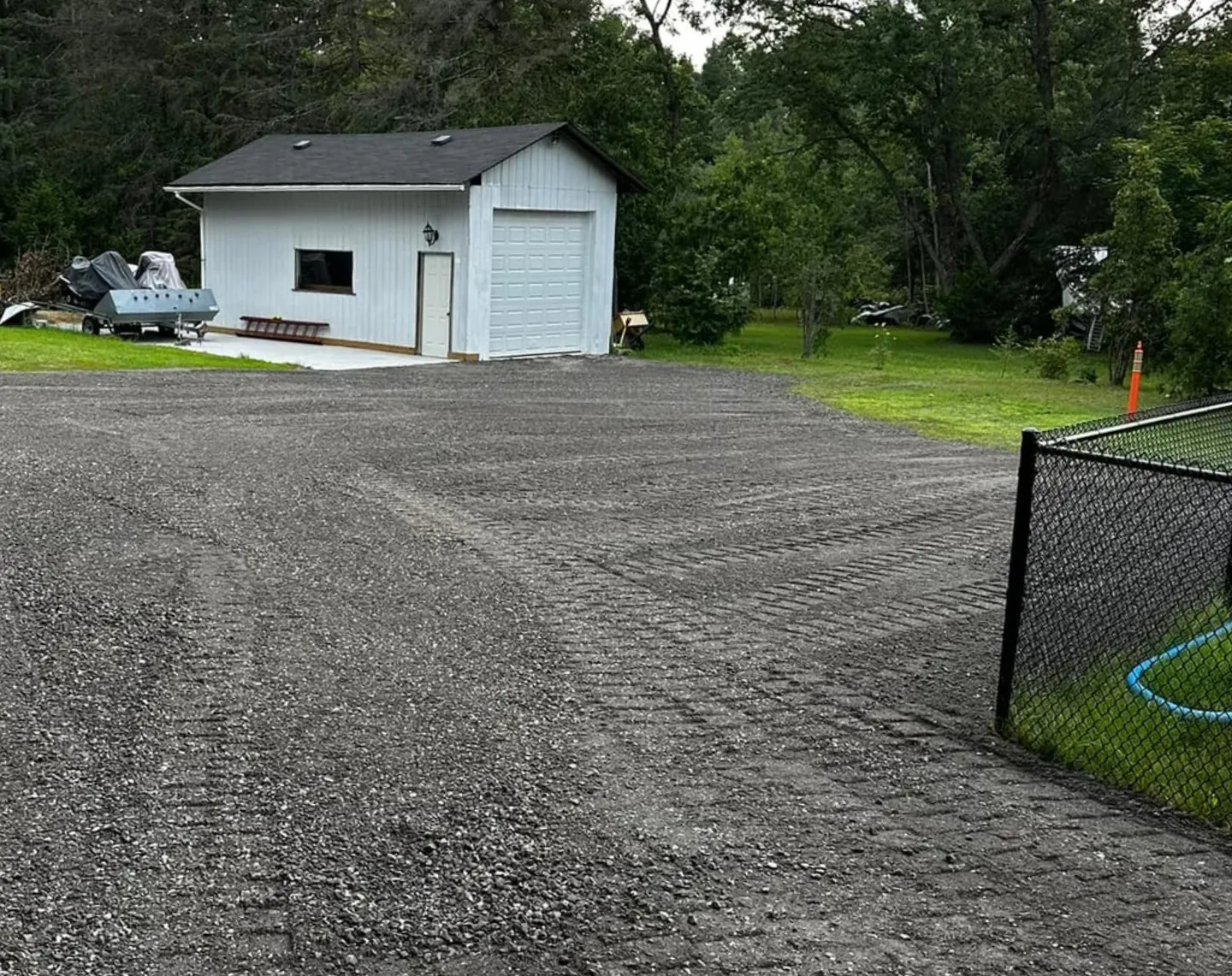 Driveway after grading and resurfacing