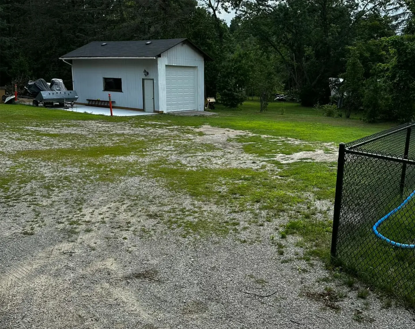 Driveway before grading and resurfacing